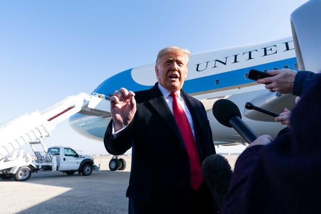 President Donald Trump speaks with reporters before boarding Air Force One upon departure, Tuesday, Jan. 12, 2021, at Andrews Air Force Base, Maryland. The President is traveling to Texas.