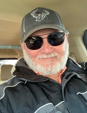 Randy Jones, seen here in November 2019, turned to his Ford F-150 to power his home in Caty, Texas during the blackouts in Texas this month.