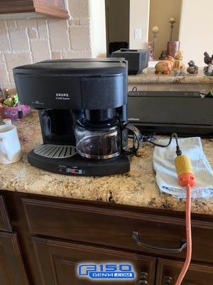 Randy Jones, a retired refinery worker from Caty, Texas and the owner of a 2021 F-150 PowerBoost Hybrid truck, used the truck generator to power his coffee maker during a blackout from February 14-17. This photo was taken Monday, February 15, 2021.