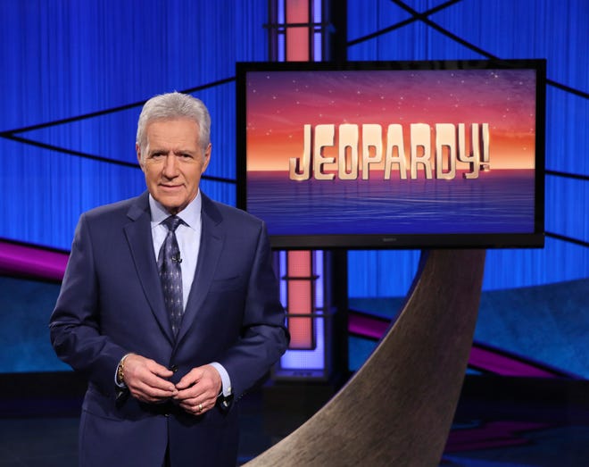 The late "Jeopardy!" host Alex Trebek won an Emmy as outstanding game-show host on the same night he was honored during a special In Memoriam segment on CBS broadcast of the Daytime Emmy Awards.