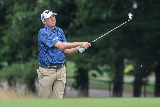 Jim Herman plays his shot on the third hole during the final round of the Travelers Championship golf tournament on June 27.