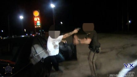 The Boone County Sheriff's Office says this picture shows a man pointing a gun into the face of a deputy.