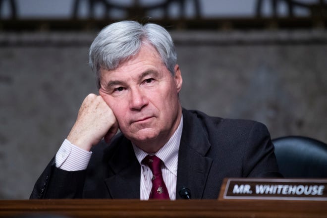 Sen. Sheldon Whitehouse, D-R.I., listens during the the Senate Judiciary Committee confirmation hearing in Dirksen Senate Office Building in Washington, Wednesday, April 28, 2021. Ketanji Brown Jackson, nominee to be U.S. Circuit Judge for the District of Columbia Circuit, and Candace Jackson-Akiwumi, nominee to be U.S. Circuit Judge for the Seventh Circuit, testified on the first panel. (Tom Williams/Pool via AP)