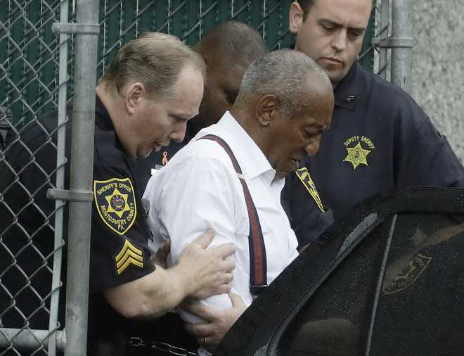 Bill&#x20;Cosby&#x20;departs&#x20;in&#x20;handcuffs&#x20;to&#x20;begin&#x20;a&#x20;three-to-10&#x20;year&#x20;prison&#x20;sentence&#x20;for&#x20;sexual&#x20;assault&#x20;after&#x20;his&#x20;sentencing&#x20;hearing&#x20;at&#x20;the&#x20;Montgomery&#x20;County&#x20;Courthouse&#x20;in&#x20;Norristown,&#x20;Pa.,&#x20;on&#x20;Sept.&#x20;25,&#x20;2018.&#x20;Pennsylvania&#x2019;s&#x20;highest&#x20;court&#x20;has&#x20;overturned&#x20;comedian&#x20;Cosby&#x2019;s&#x20;sex&#x20;assault&#x20;conviction.&#x20;The&#x20;court&#x20;said&#x20;Wednesday,&#x20;June&#x20;30,&#x20;2021,&#x20;that&#x20;they&#x20;found&#x20;an&#x20;agreement&#x20;with&#x20;a&#x20;previous&#x20;prosecutor&#x20;prevented&#x20;him&#x20;from&#x20;being&#x20;charged&#x20;in&#x20;the&#x20;case.