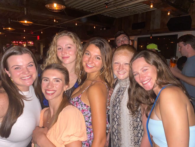 Carolyn Xenalis (third from right) has enjoyed working in the office, meeting new people and exploring night life in New York City this summer.