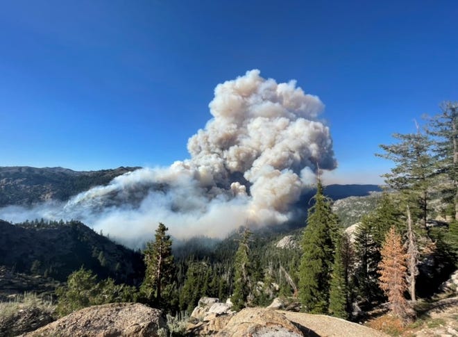 The smoke of the Tamarack Fire can be seen. Currently at an estimated 500 acres, all residents in the Markleeville area have been ordered to evacuate immediately. Photo taken on July 16, 2021.