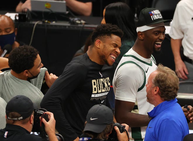 Giannis Antetokounmpo celebrates after the Bucks' Game 6 win over the Hawks.