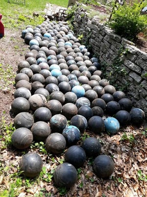 Olson's final count of the buried bowling balls totaled 158, though he said there are definitely more still buried.