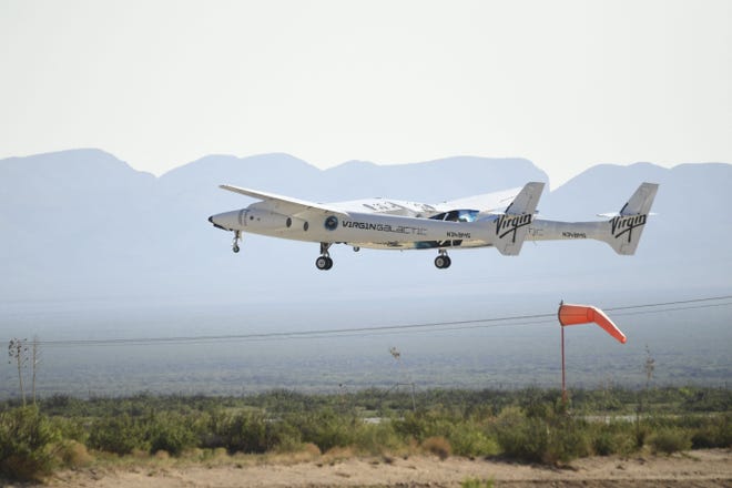 The Virgin Galactic SpaceShipTwo space plane Unity flies at Spaceport America, near Truth and Consequences, New Mexico on July 11, 2021.