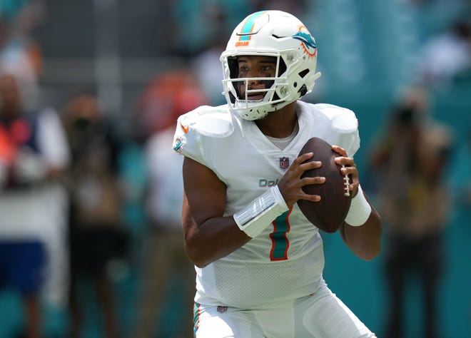 Miami Dolphins quarterback Tua Tagovailoa (1) attempts a pass against the Buffalo Bills during the first half at Hard Rock Stadium.