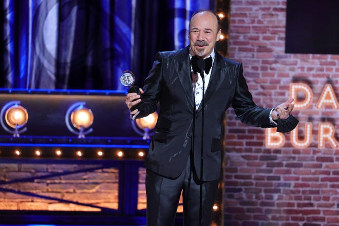 Danny Burstein accepts the award for Best Performance by an Actor in a Featured Role in a Musical for "Moulin Rouge! The Musical." 