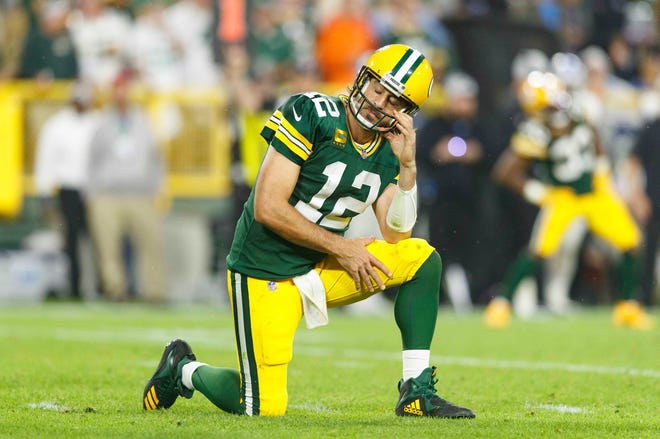 Packers quarterback Aaron Rodgers reacts after a play against the Lions on Monday night.