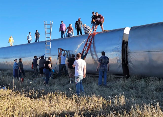 People work at the scene of an Amtrak train derailment on Sept. 25 in north-central Montana.