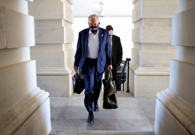 Senate Majority Leader Charles Schumer, D-N.Y., arrives at the U.S. Capitol on Sept. 27, 2021 in Washington, D.C. The Senate is working on passing a funding bill for the U.S. government and an increase to the debt ceiling before a possible government shutdown at the end of the week.