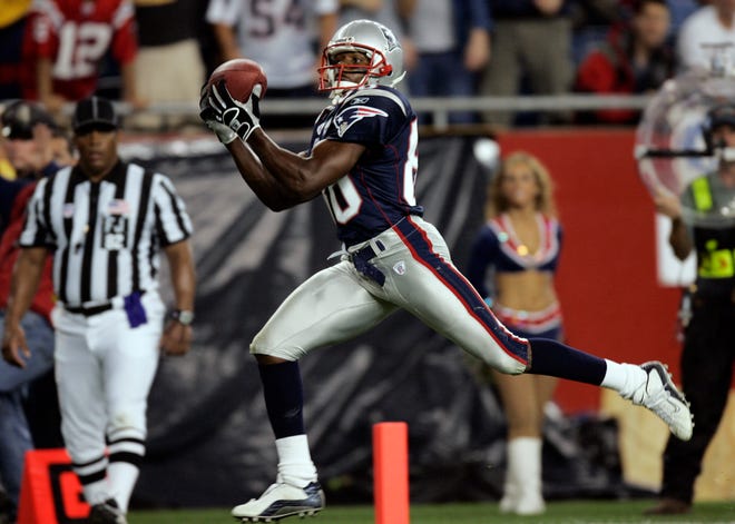 Former Patriots wide receiver David Patten caught Tom Brady's first postseason TD in the Super Bowl 36 victory over the Rams.