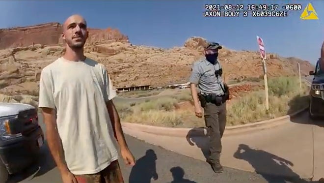 This police camera video provided by The Moab Police Department shows Brian Laundrie talking to a police officer after police pulled over the van he was traveling in with his girlfriend, Gabrielle 'Gabby' Petito, near the entrance to Arches National Park on Aug. 12, 2021.