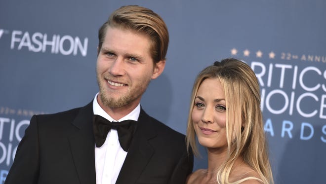 Kaley Cuoco, right, and Karl Cook announced their engagement on Nov. 30, 2017.