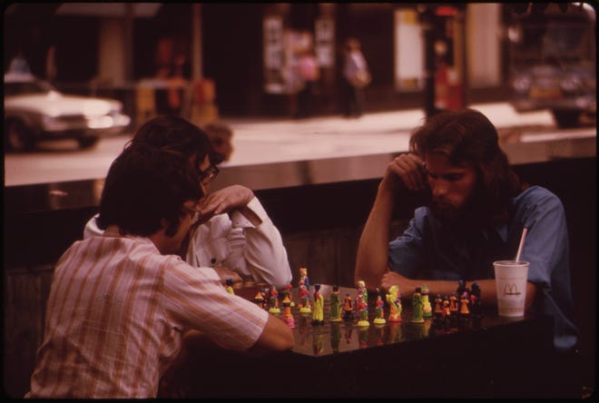 One of the Three Marble Chess Tables That Are Permanent Fixtures at Fountain Square. Intersection of Fifth and Vine Streets in Background 08/1973
