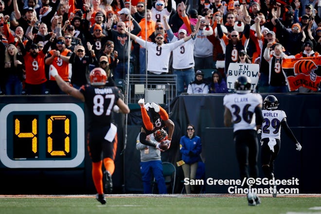 Cincinnati Bengals receiver Tyler Boyd flips into the end zone on his 68-yard touchdown catch during the second quarter of Sunday's game against the Baltimore Ravens.