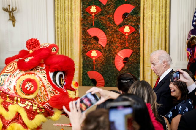 Members of the Choy Wun Lion Dance Troupe perform at a White House reception hosted by President Joe Biden to celebrate Lunar New Year on Jan. 26.