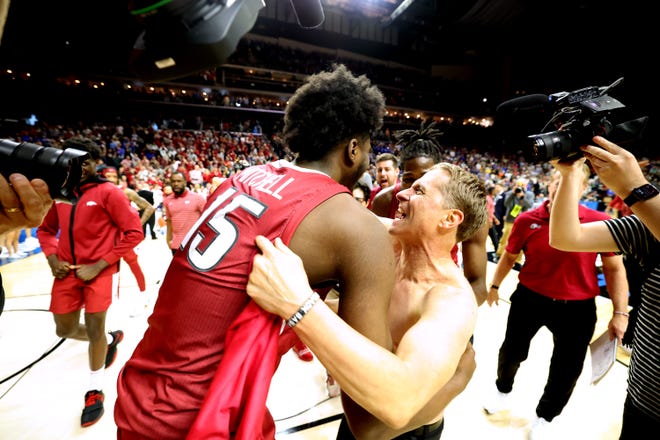 Arkansas head coach Eric Musselman ripped his shirt off in the Razorbacks' postgame celebration after they defeated No. 1 Kansas.