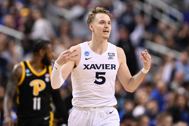 Xavier Musketeers guard Adam Kunkel (5) celebrates after scoring  during the first half against the Pittsburgh Panthers.