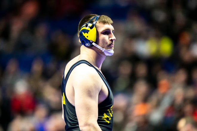 Michigan's Mason Parris gets ready before wrestling at 285 pounds during the second session of the NCAA Division I Wrestling Championships, Thursday, March 16, 2023, at BOK Center in Tulsa, Okla.